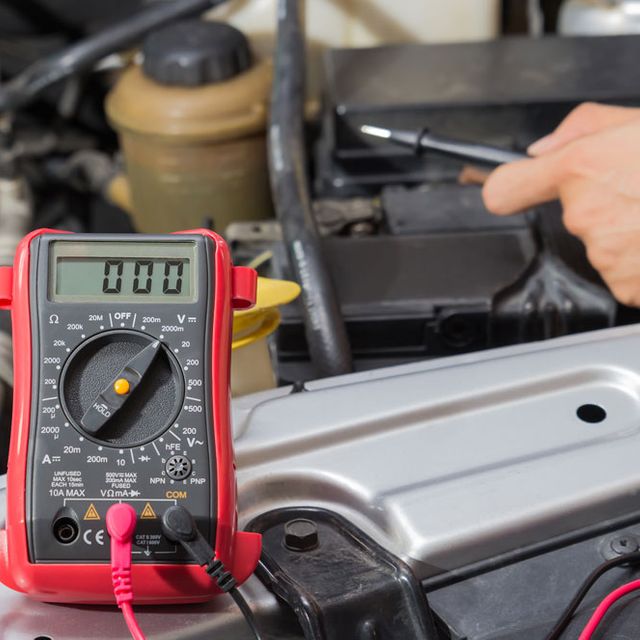 St Michael's Street Garage mechanic with electronic reader